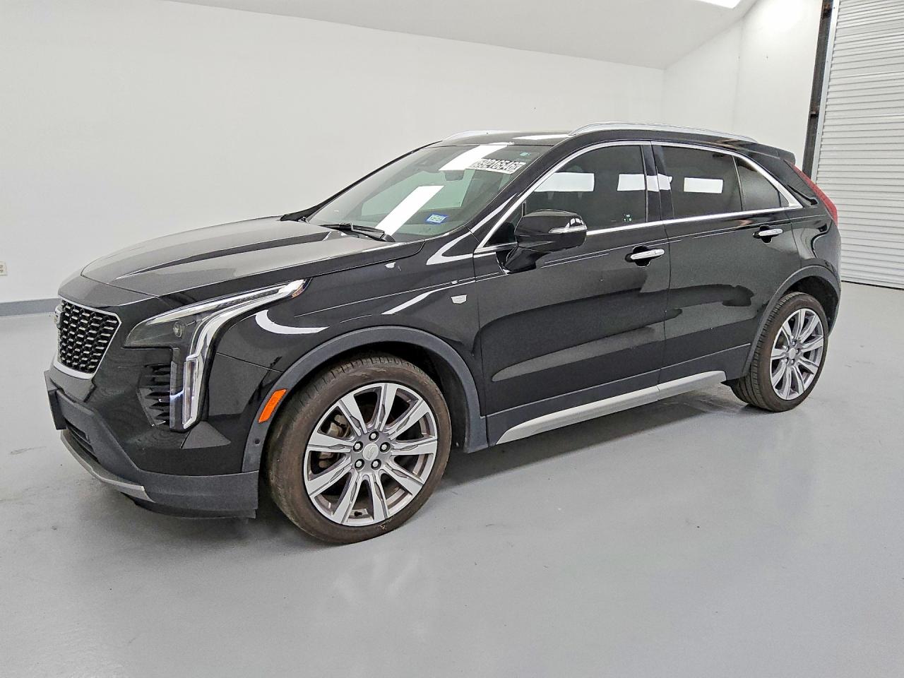 2019 Cadillac XT4 FWD Premium Luxury, VIN 1GYFZCR40KF146383 — Hail