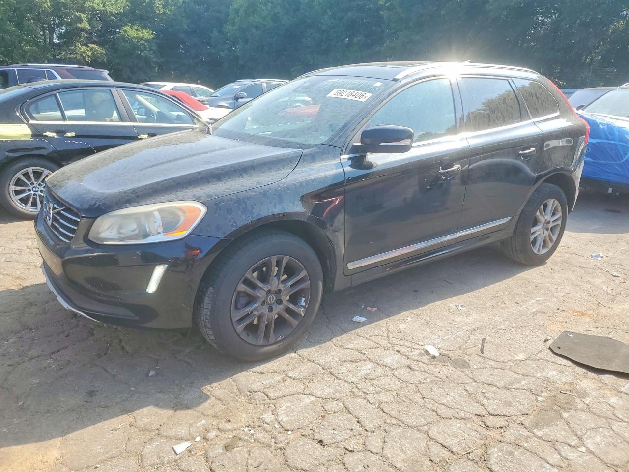 2015 Volvo XC60 T5 Drive-E Premier, VIN YV440MDK0F2738203 — Front end