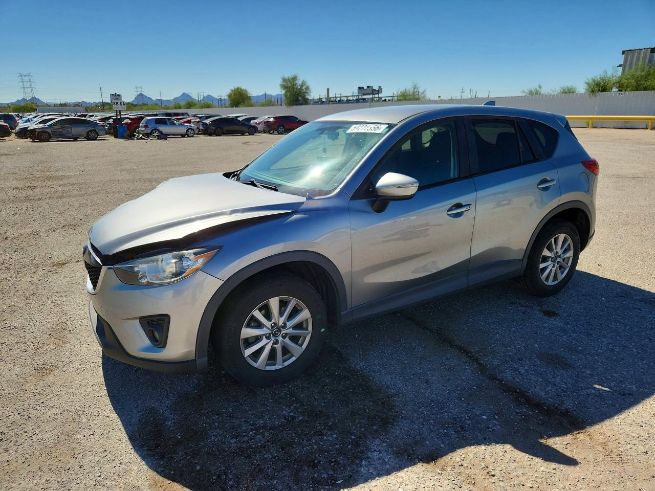 2015 Mazda CX-5 Touring, VIN JM3KE2CY8F0504562 — Side