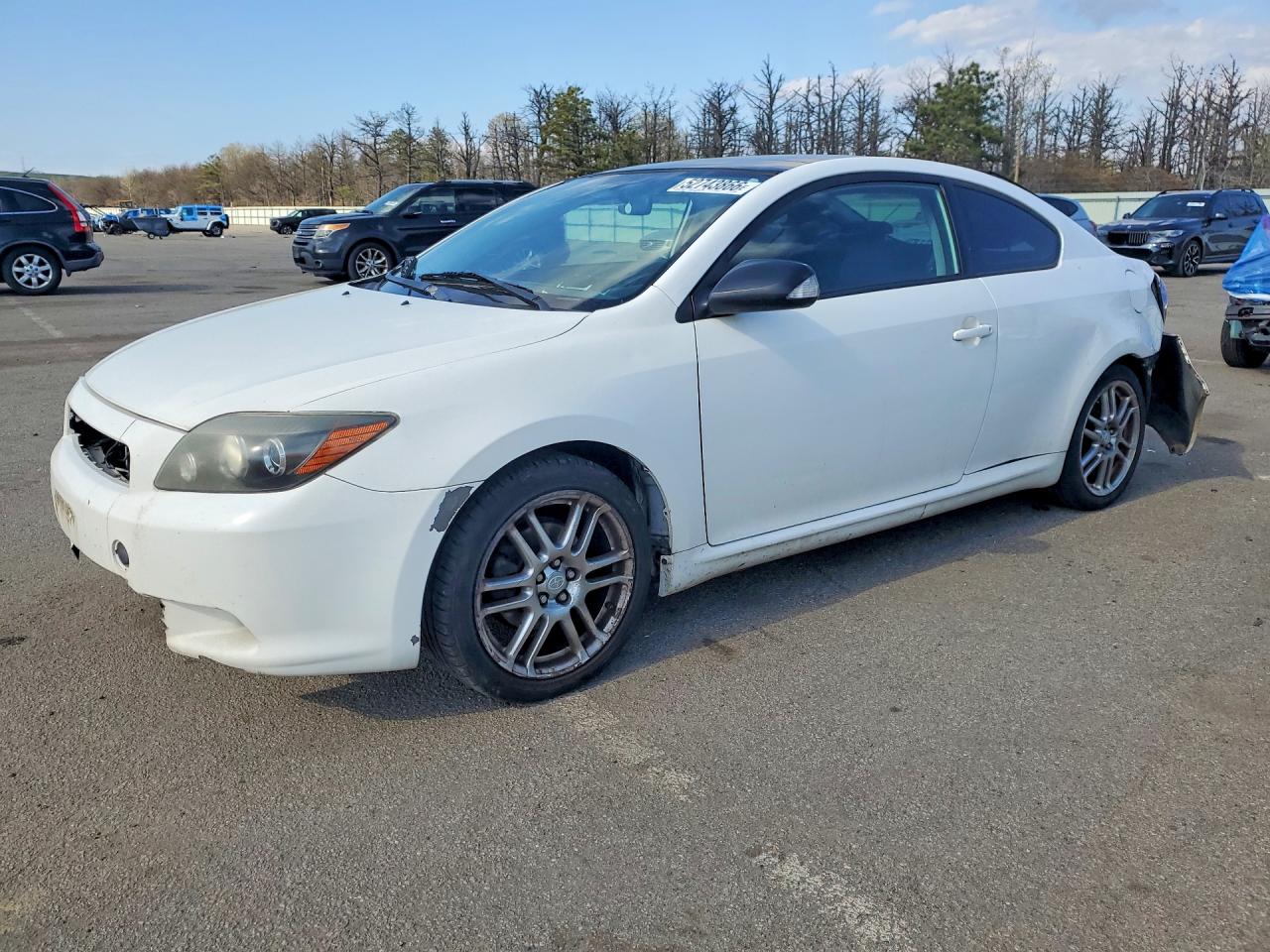 2009 Scion tC, VIN JTKDE167490290066 — Зад