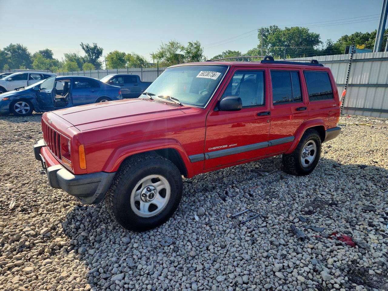 1999 Jeep Cherokee Sport, VIN 1J4FF68S5XL614739 — Normal wear