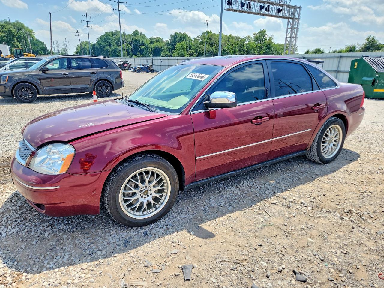 2005 Ford Five Hundred Limited, VIN 1FAFP251X5G146686 — Side