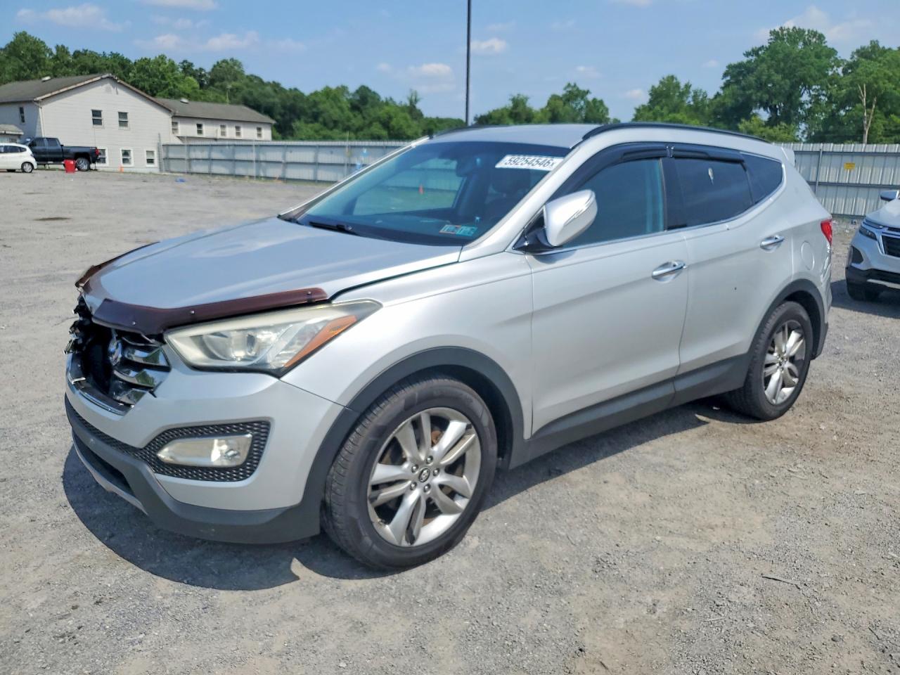 2013 Hyundai Santa Fe Sport, VIN 5XYZUDLA0DG065910 — Front end