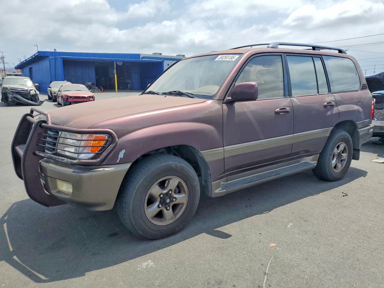 2000 Toyota Land Cruiser, VIN JT3HT05JXY0092567 — Side