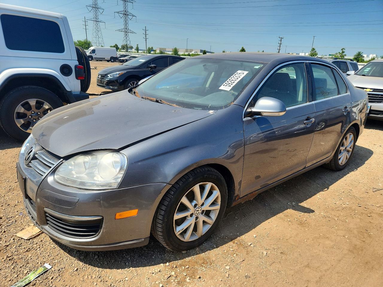 2010 Volkswagen Jetta SE, VIN 3VWRZ7AJ4AM103138 — Бок