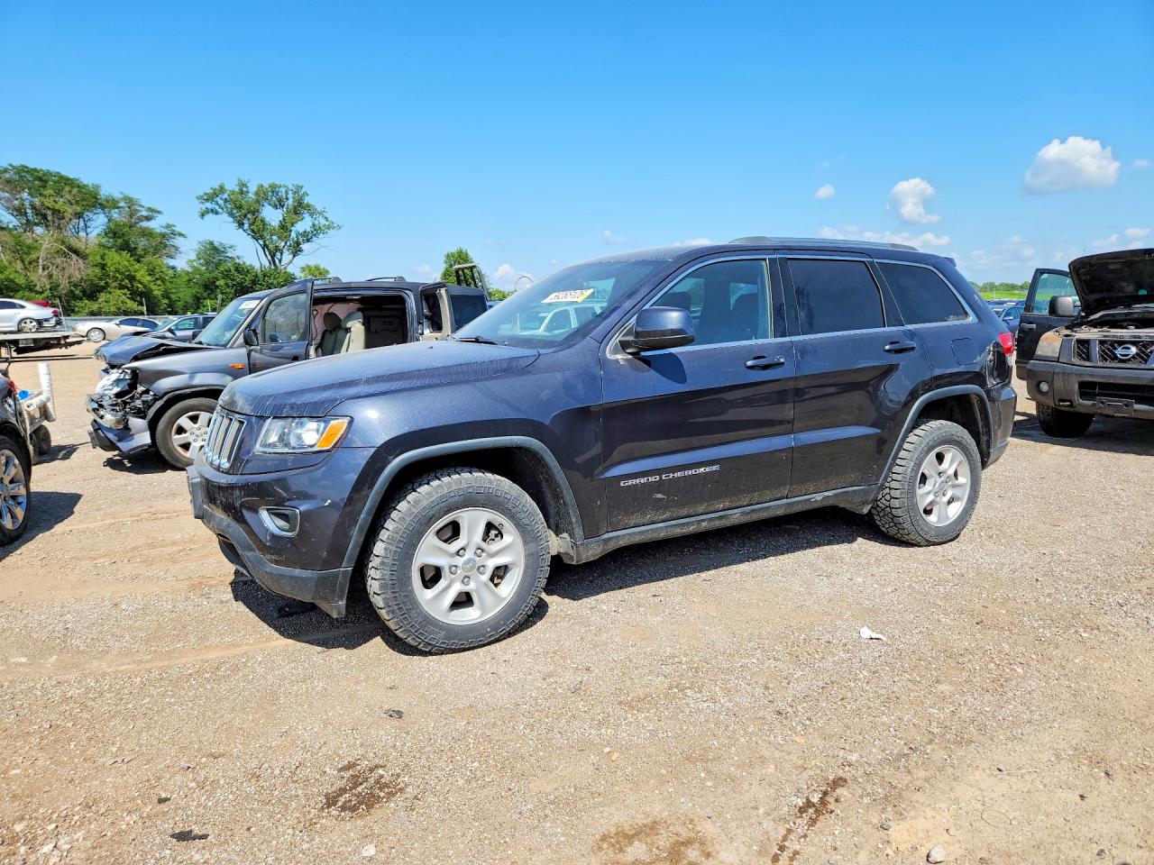 2015 Jeep Grand Cherokee Altitude, VIN 1C4RJFAG1FC806407 — Бок