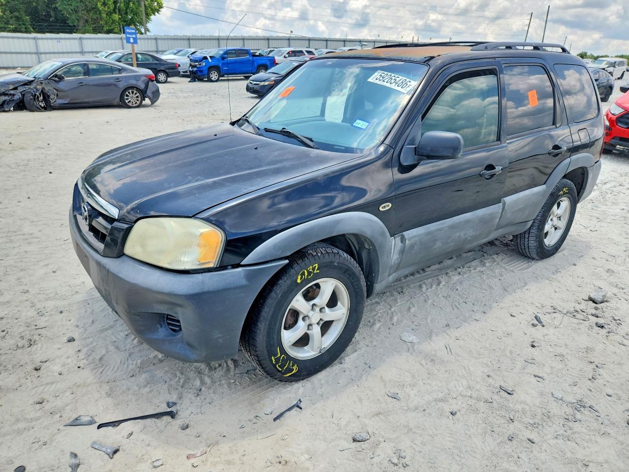 2006 Mazda Tribute i, VIN 4F2YZ02Z66KM07273 — Side