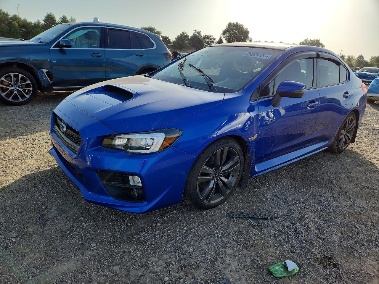 2017 Subaru WRX Limited, VIN JF1VA1N61H8815803 — Side