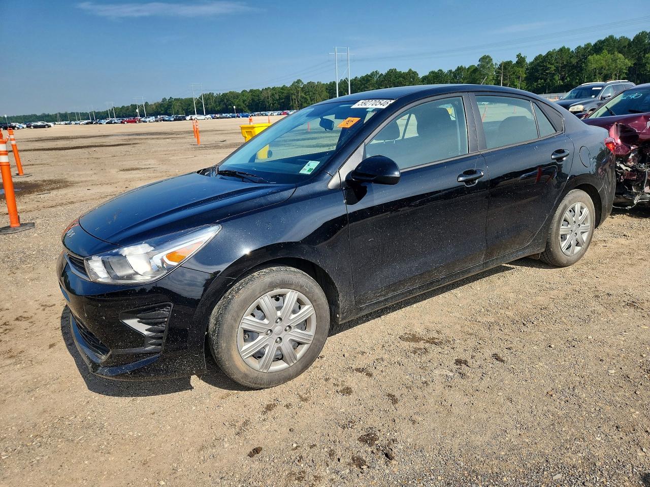 2023 Kia Rio S, VIN 3KPA24AD0PE515816 — Water / flood