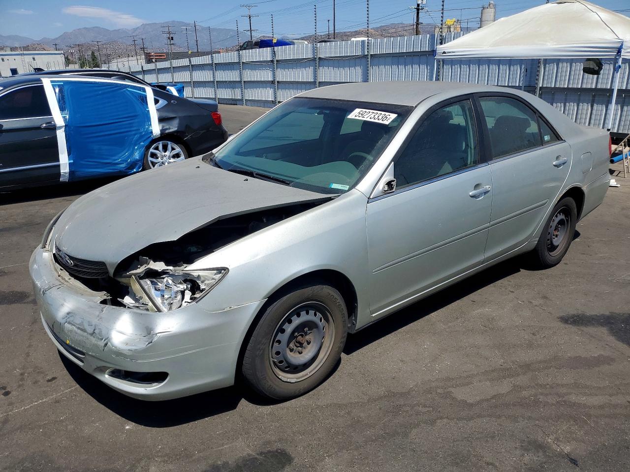 2003 Toyota Camry XLE, VIN JTDBE32KX30227629 — Front end