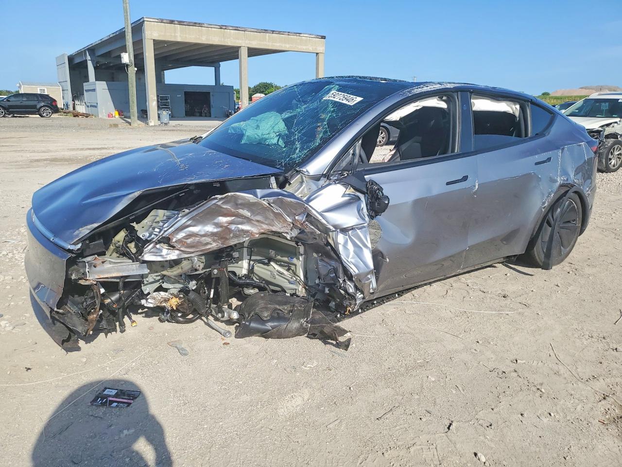 2026 Tesla Model Y Long Range, VIN 7SAYGDED1TA704277 — Rollover