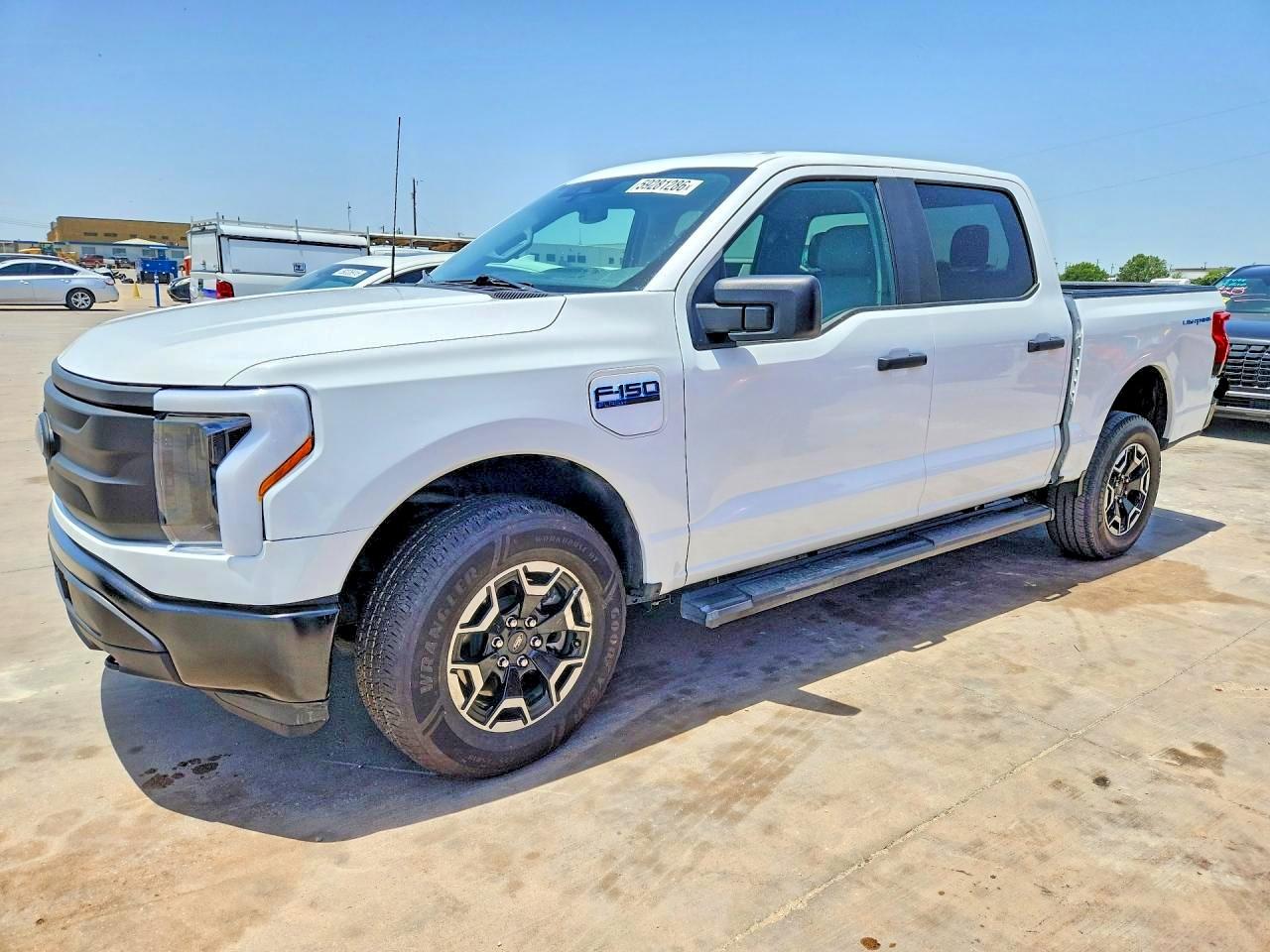 2022 Ford F-150 Lightning XLT, VIN 1FTVW1EL1NWG14881 — Normal wear