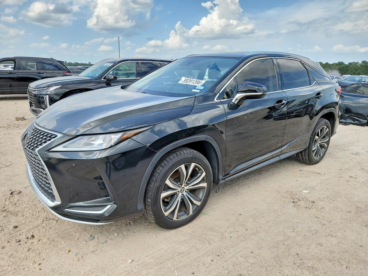 2021 Lexus RX 350, VIN 2T2HZMAA0MC210371 — Side