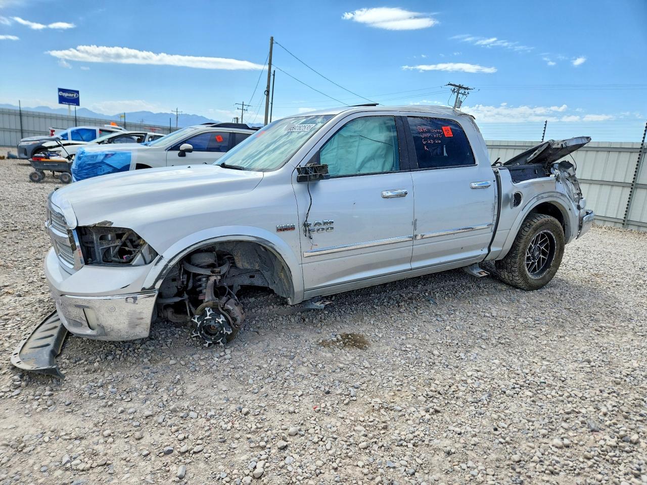2015 Ram 1500 Laramie Limited, VIN 1C6RR7PT9FS529070 — Rollover
