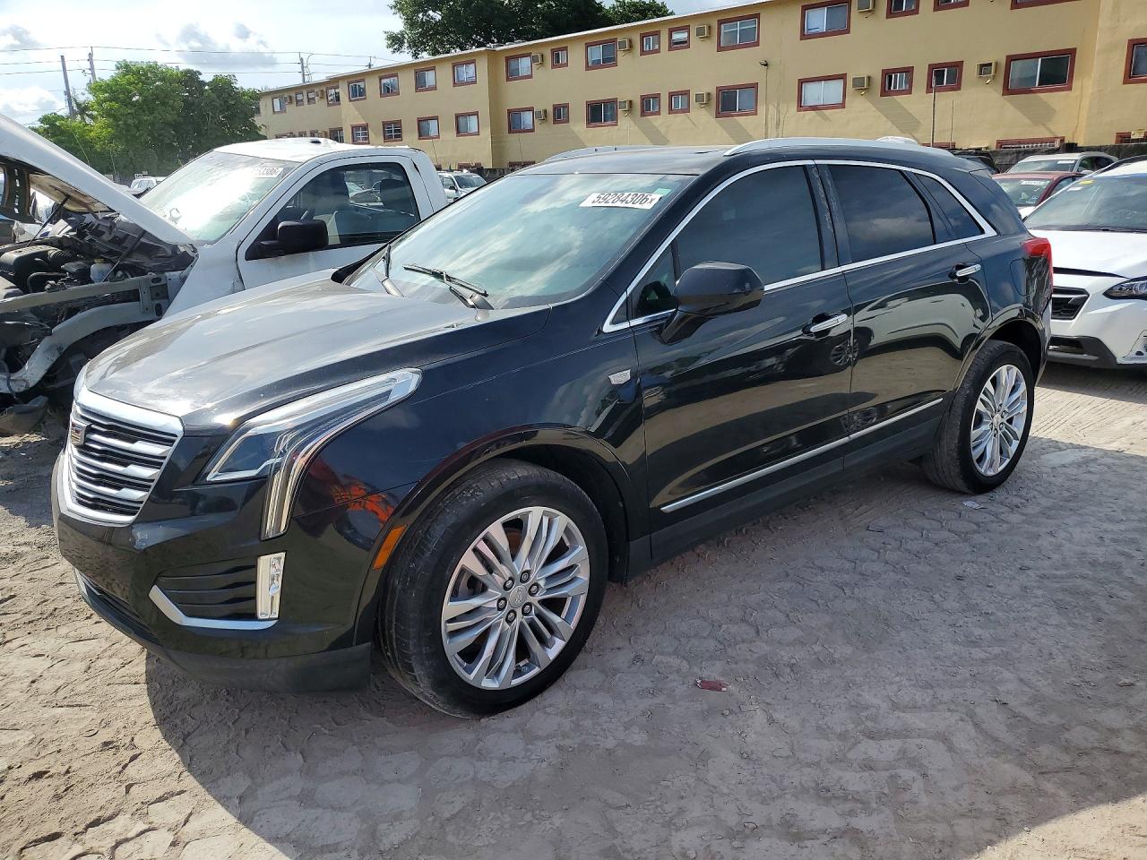 2017 Cadillac XT5 Premium Luxury FWD, VIN 1GYKNCRS8HZ112031 — Water / flood