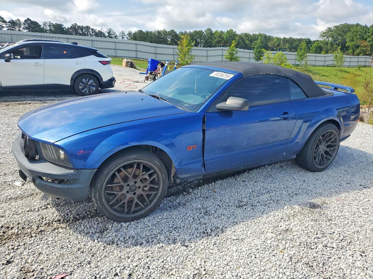 2006 Ford Mustang GT Deluxe, VIN 1ZVHT85H765255227 — Side