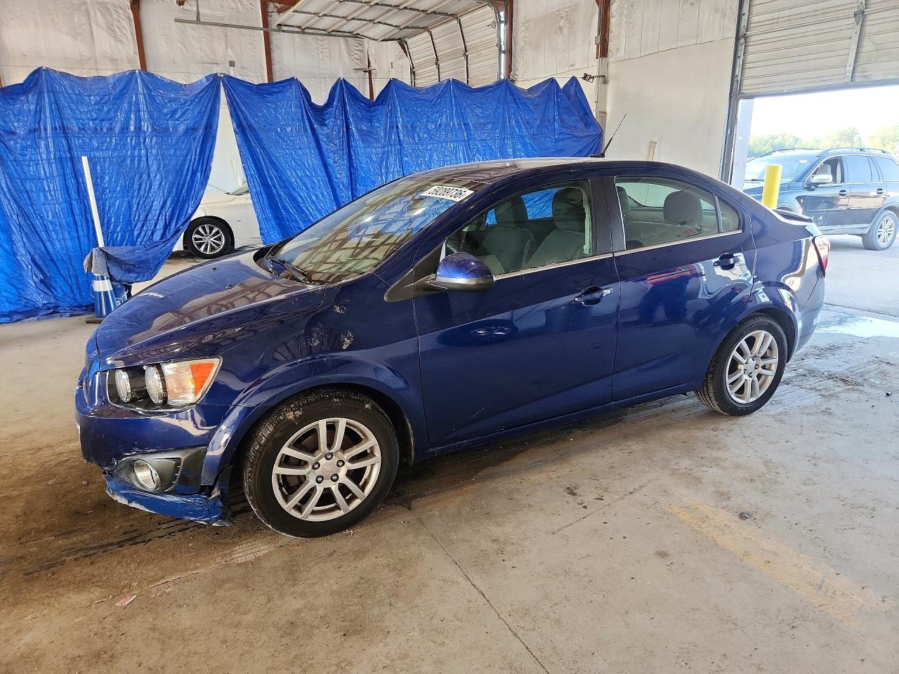 2014 Chevrolet Sonic LT, VIN 1G1JC5SH4E4148754 — Water / flood