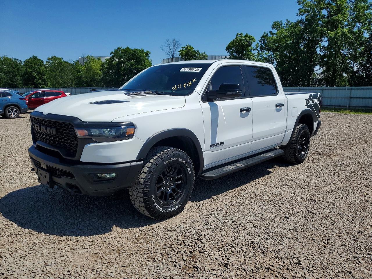 2025 Ram 1500 Rebel, VIN 1C6SRFLP8SN594053 — Minor dents and scratches