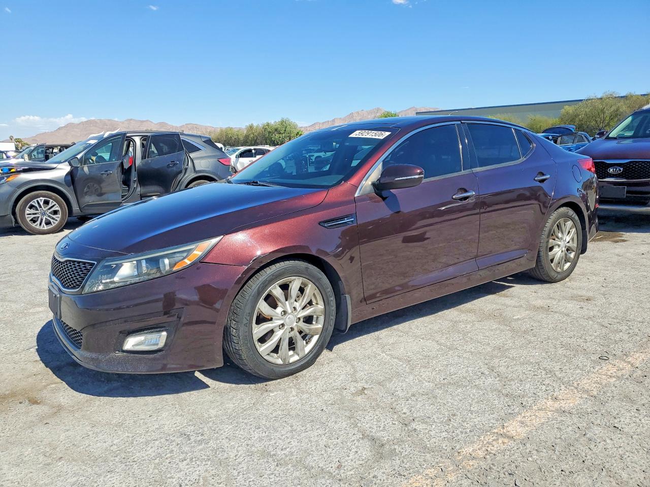 2014 Kia Optima EX, VIN 5XXGN4A75EG312596 — Vandalism