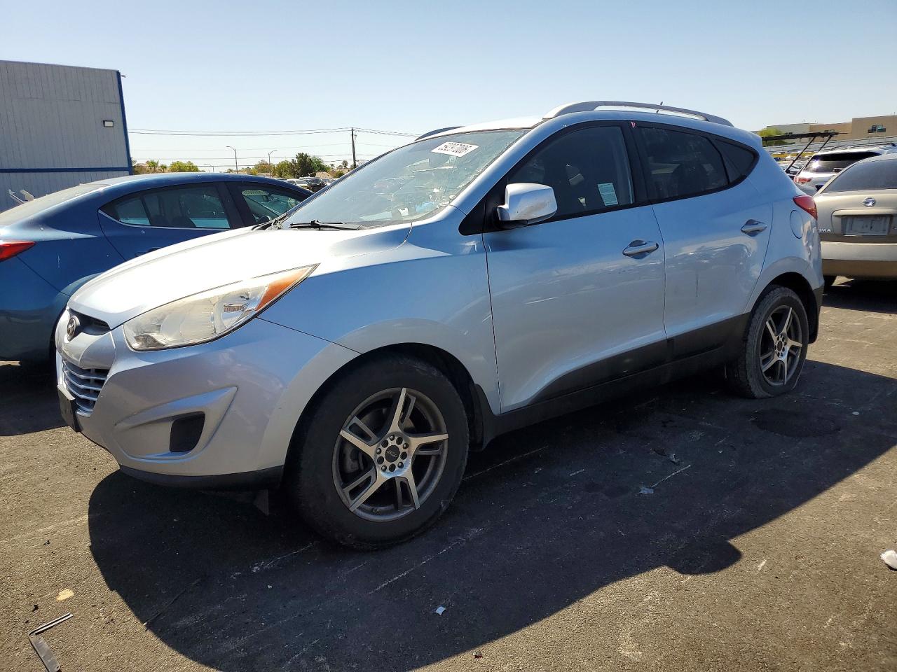 2011 Hyundai Tucson GLS, VIN KM8JUCAC1BU226557 — Vandalism