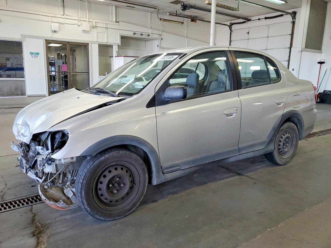 2001 Toyota ECHO, VIN JTDBT123510104742 — Front end