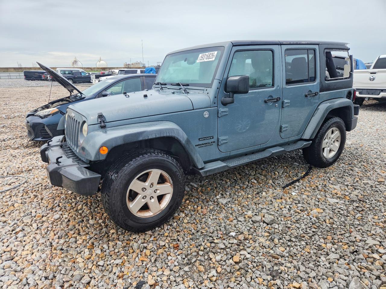 2014 Jeep Wrangler Unlimited Sport, VIN 1C4HJWDG4EL104409 — Water / flood
