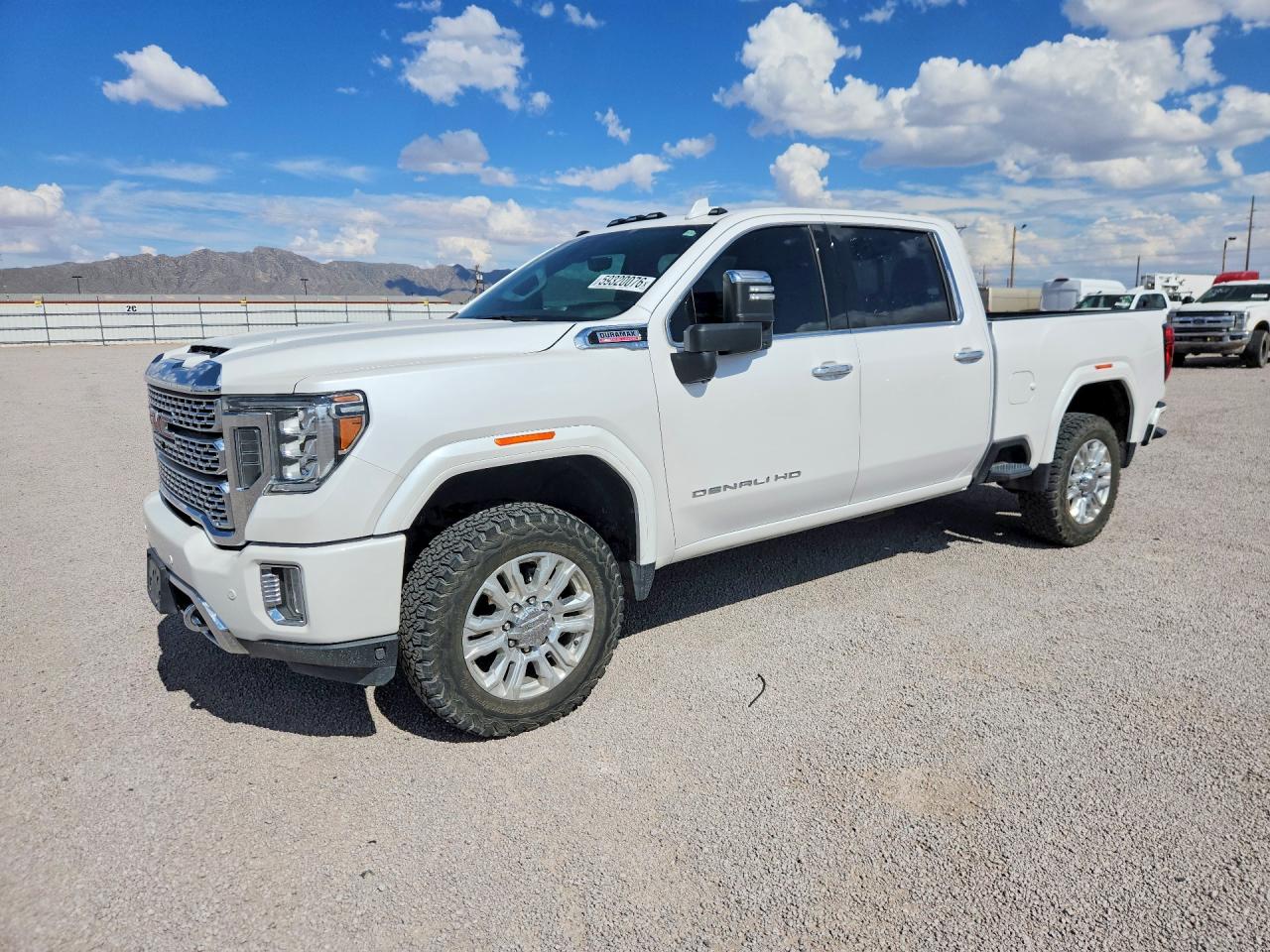2020 GMC Sierra 2500HD Denali, VIN 1GT49REY6LF113558 — Minor dents and scratches