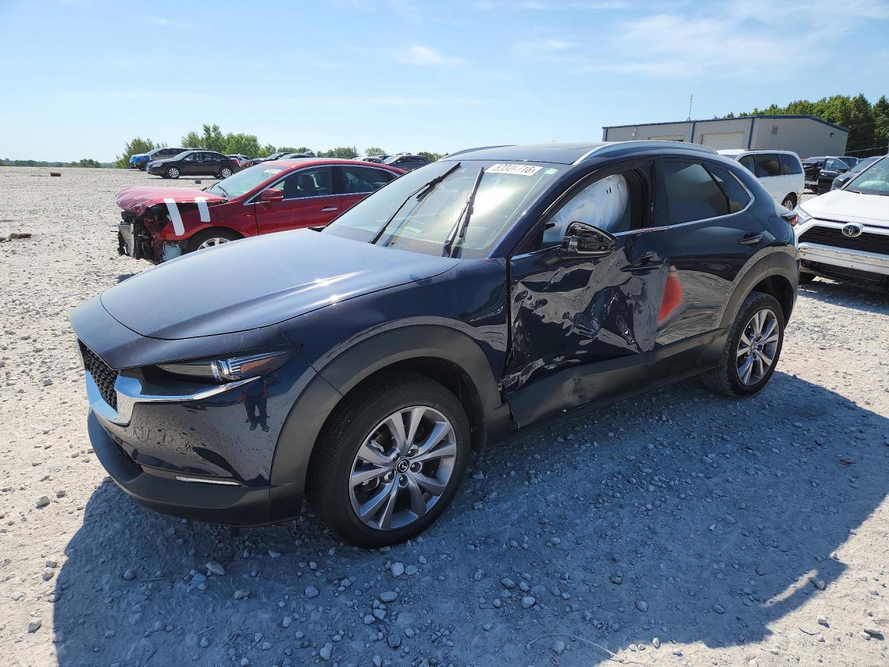 2022 Mazda CX-30 S Premium, VIN 3MVDMBDL9NM407291 — Side