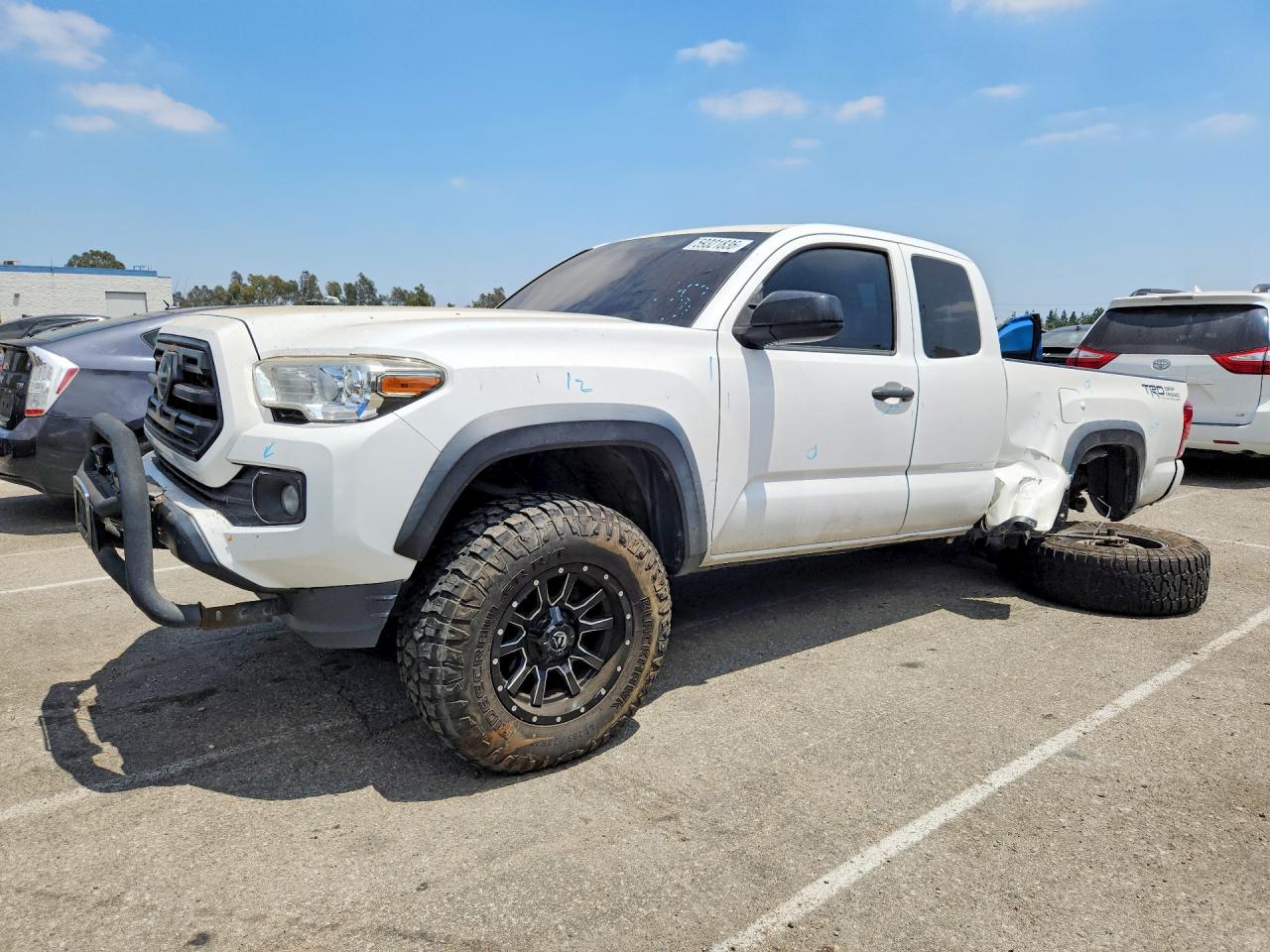 2019 Toyota Tacoma SR, VIN 5TFRZ5CN7KX072910 — Side