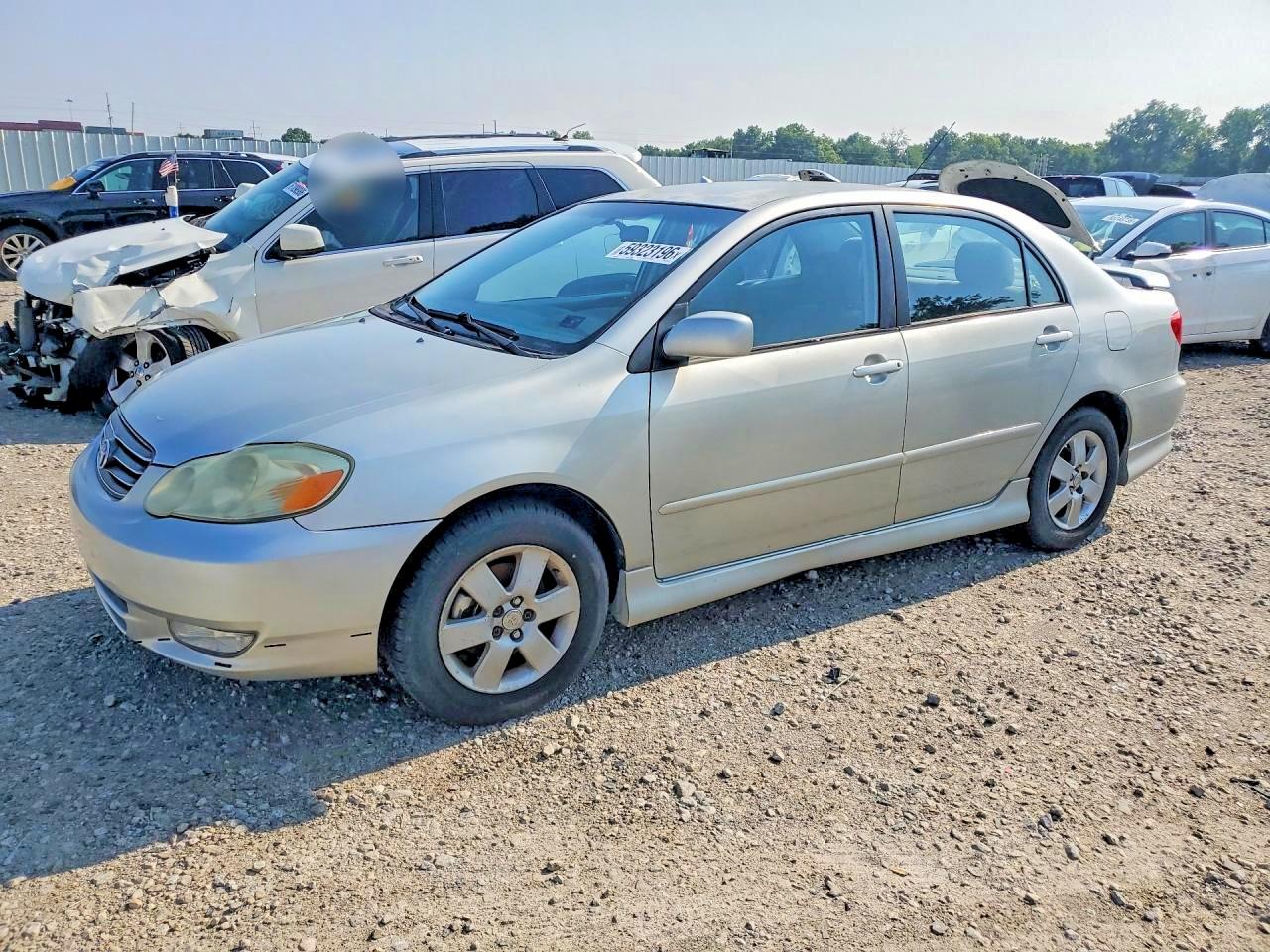 2004 Toyota Corolla LE, VIN 1NXBR32E04Z333477 — Rear end