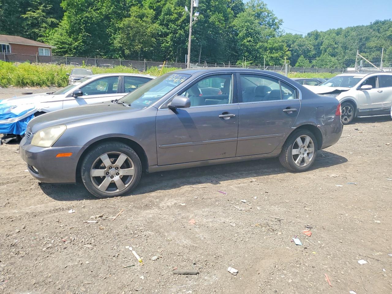 2006 Kia Optima LX, VIN KNAGE124965039832 — Бок