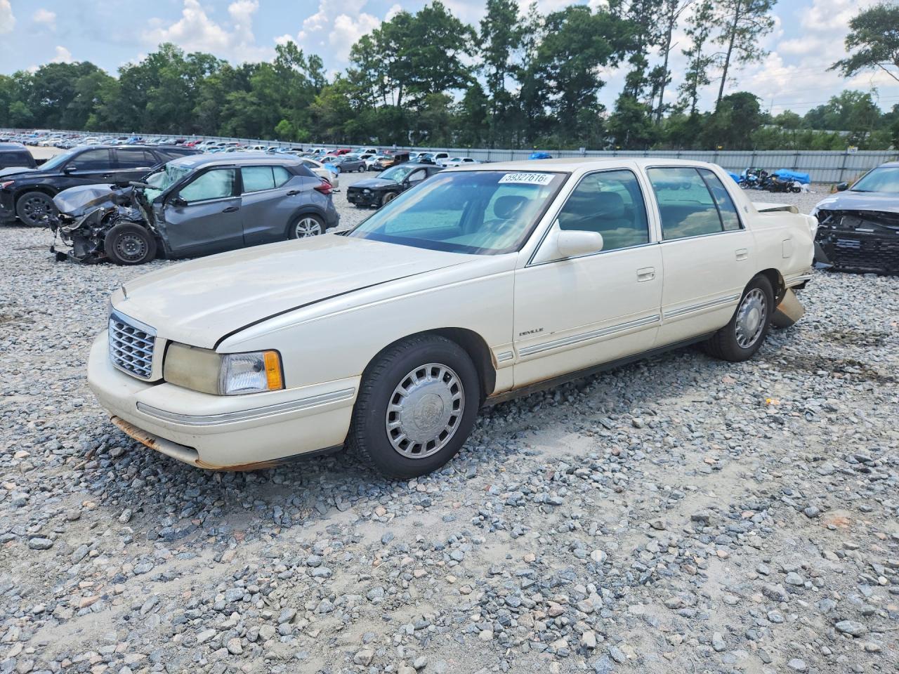 1999 Cadillac DeVille, VIN 1G6KD54Y3XU800260 — Rear end