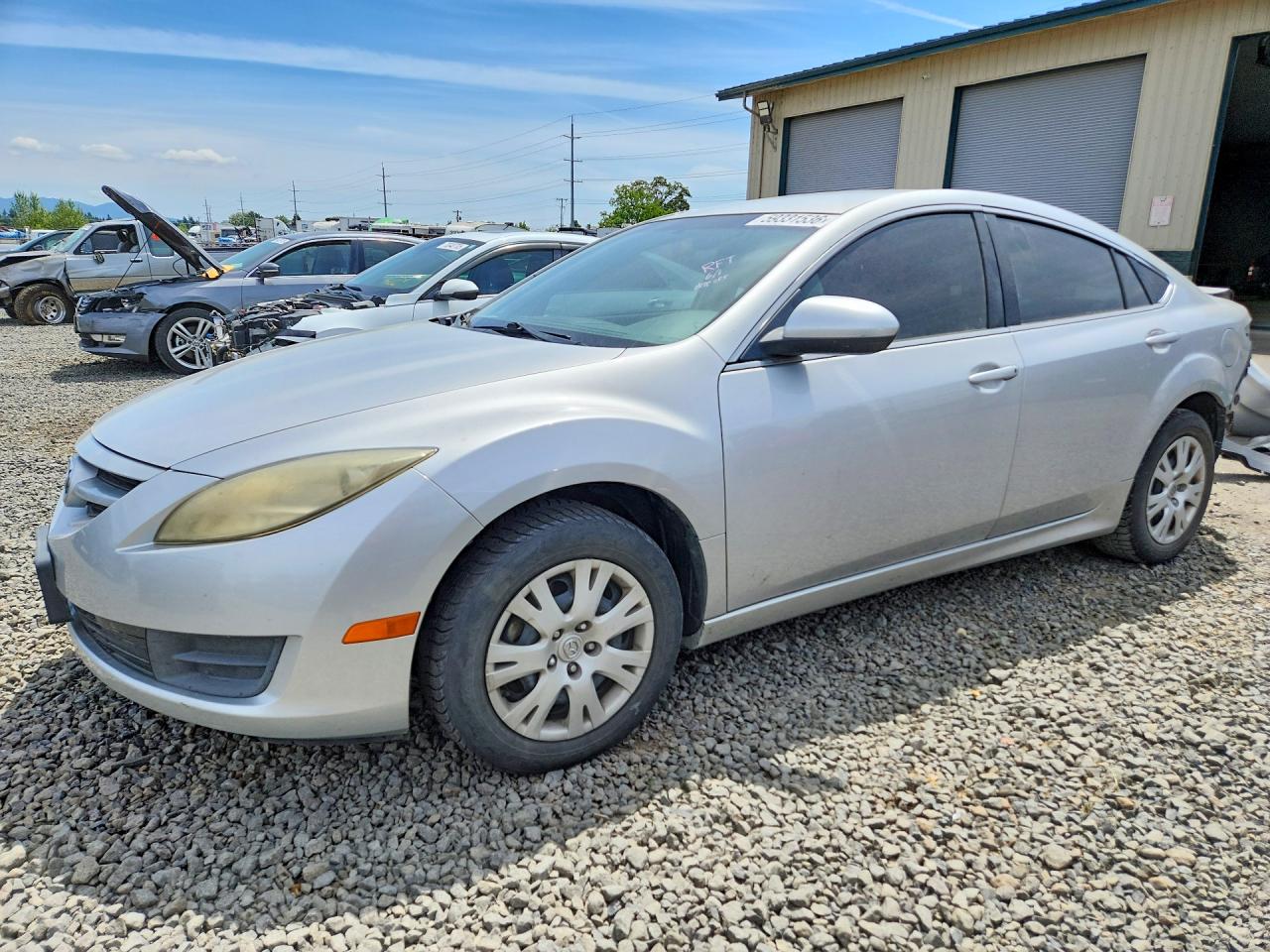 2009 Mazda 6 i Sport, VIN 1YVHP81H095M50436 — Зад