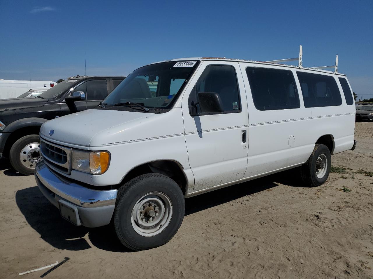 1997 Ford Econoline Wagon XL, VIN 1FBJS31L0VHA34042 — Side