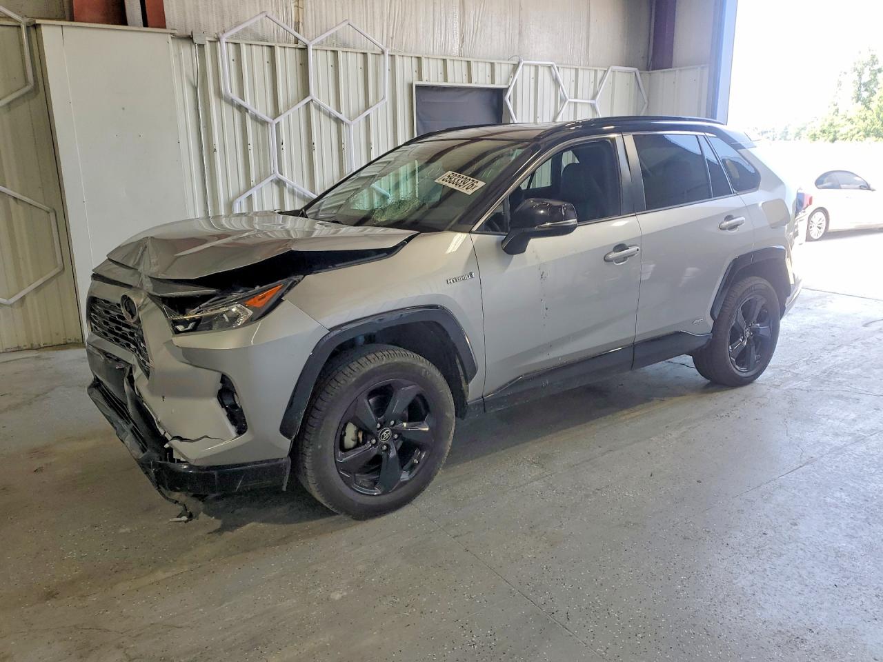 2019 Toyota RAV4 Hybrid XSE, VIN 2T3EWRFV5KW015264 — Front end