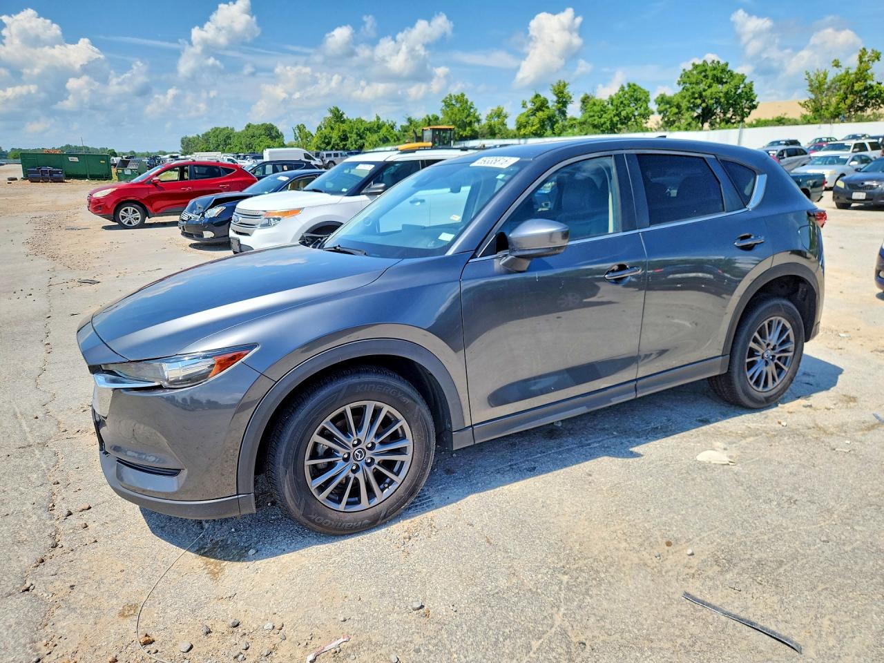 2021 Mazda CX-5 Touring, VIN JM3KFBCM5M0411702 — Front end