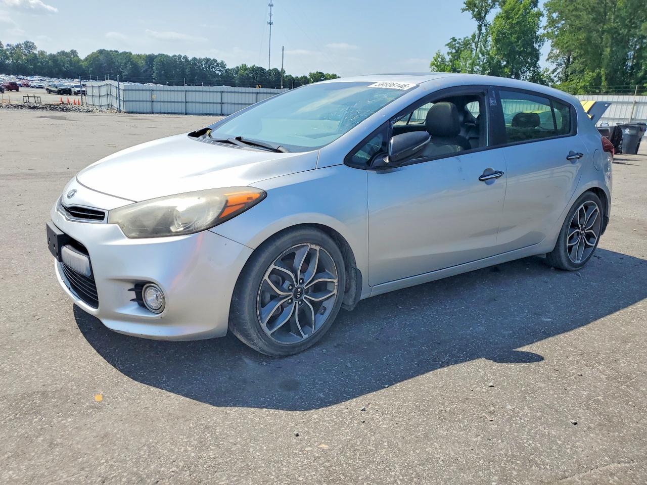 2015 Kia Forte SX, VIN KNAFZ5A39F5298661 — Side