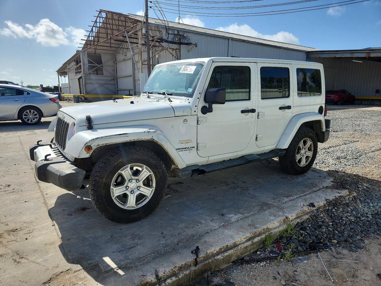 2014 Jeep Wrangler Unlimited Polar, VIN 1C4HJWEG5EL104644 — Side