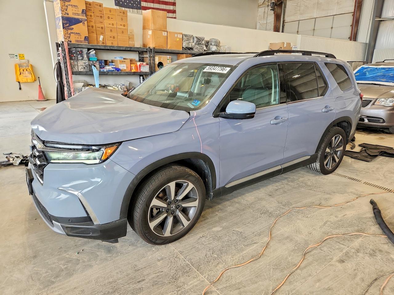 2023 Honda Pilot Elite, VIN 5FNYG1H89PB043049 — Перед