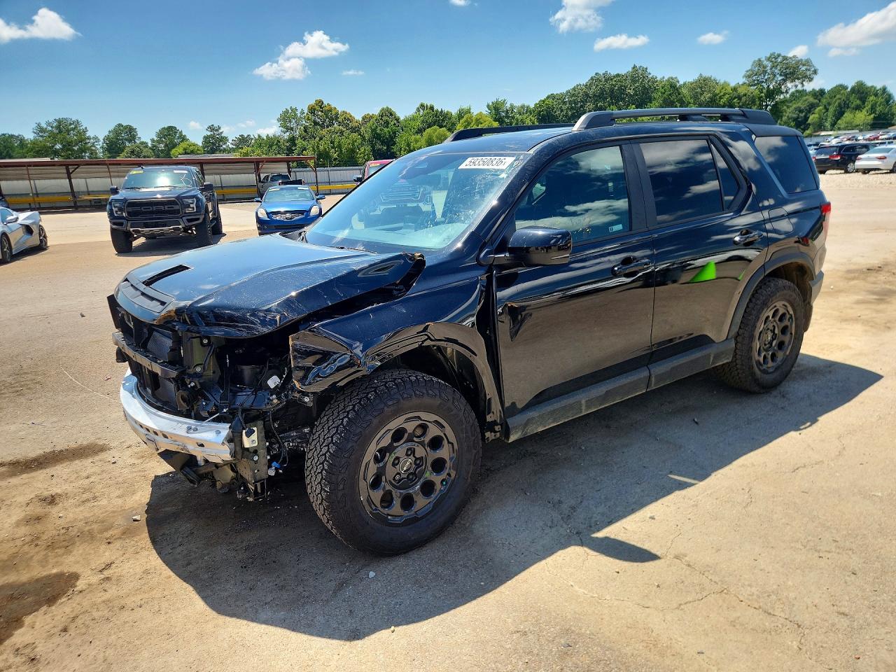 2026 Honda Passport TrailSport, VIN 5FNYF9H56TB058352 — Front end