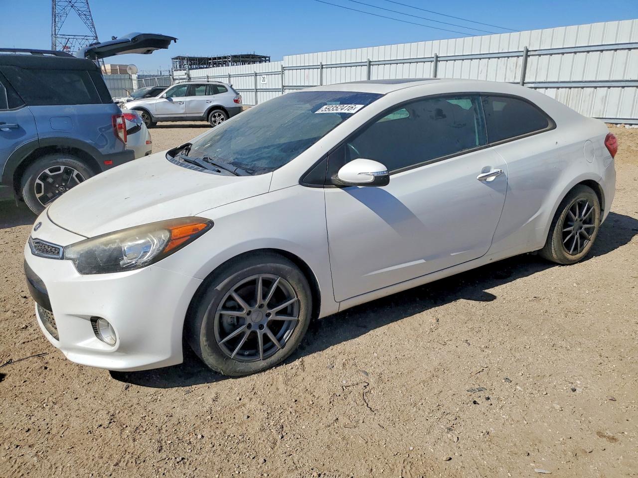 2016 Kia Forte EX, VIN KNAFX6A87G5659037 — Мелкие вмятины и царапины