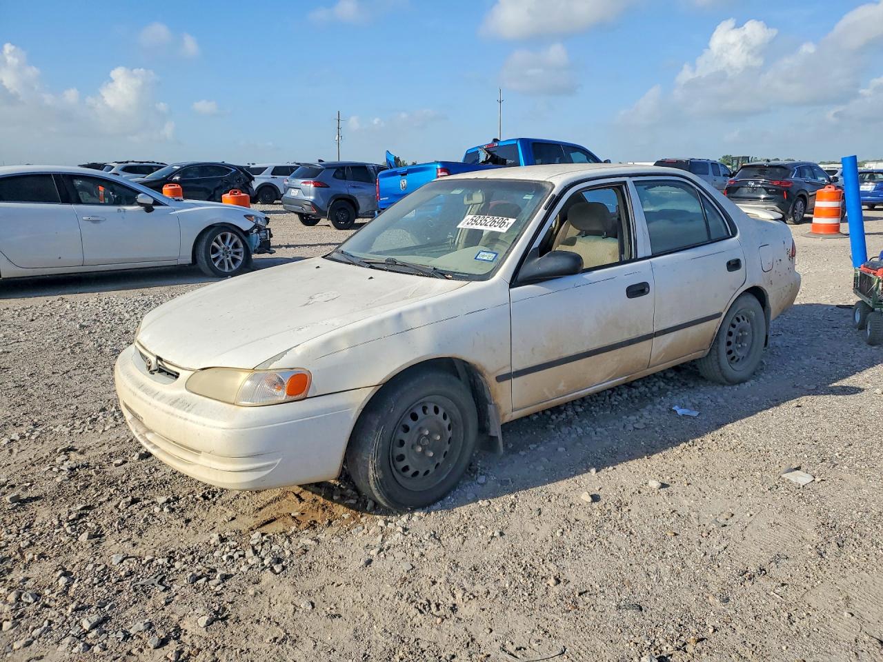 1999 Toyota Corolla CE, VIN 1NXBR12EXXZ288797 — Minor dents and scratches