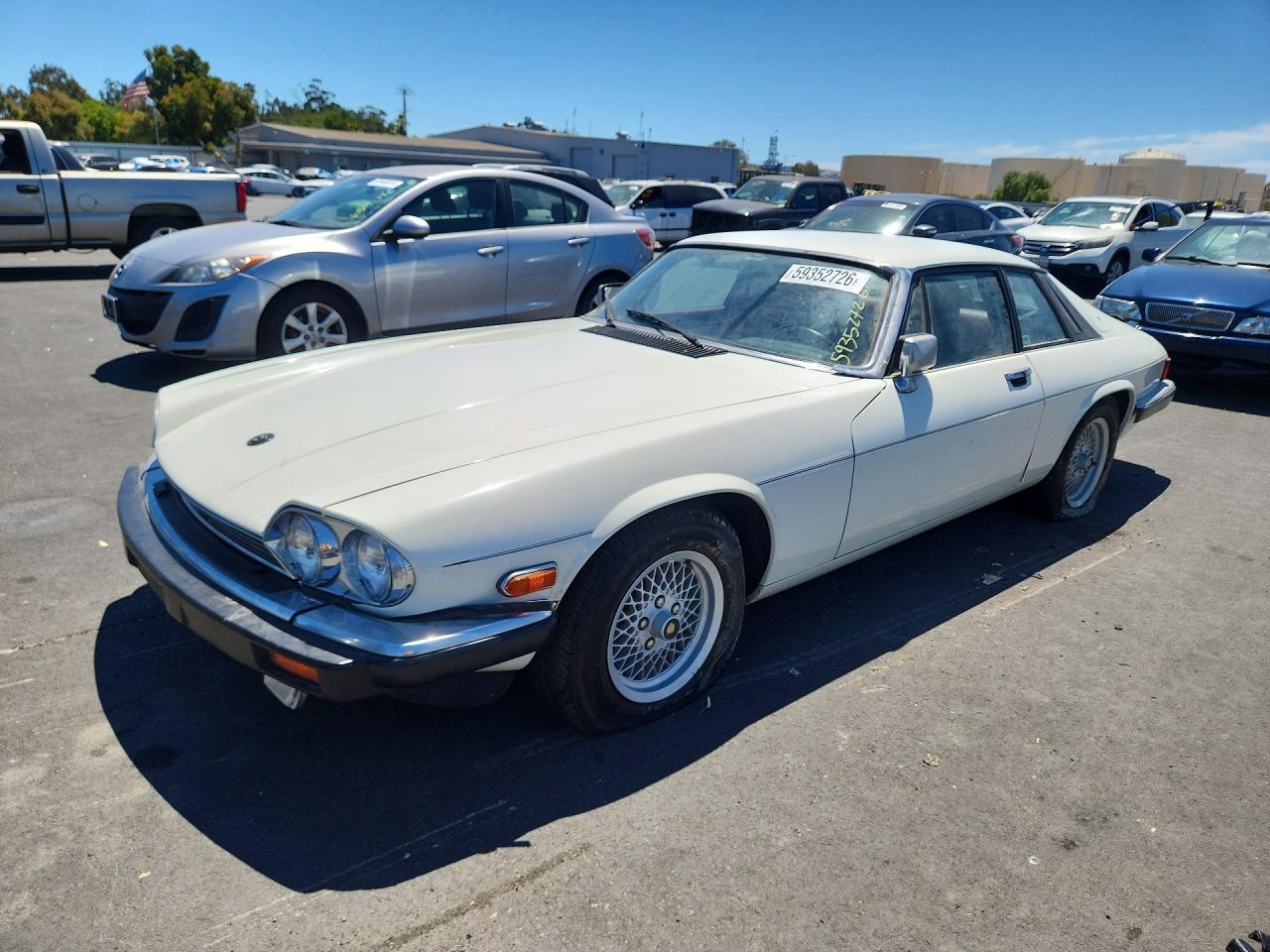 1989 Jaguar XJS, VIN SAJNY5847KC158289 — Minor dents and scratches
