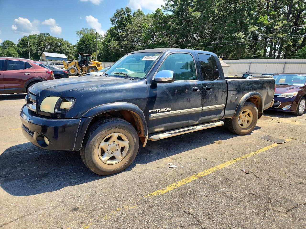 2004 Toyota Tundra SR5, VIN 5TBBT44154S439653 — Бок