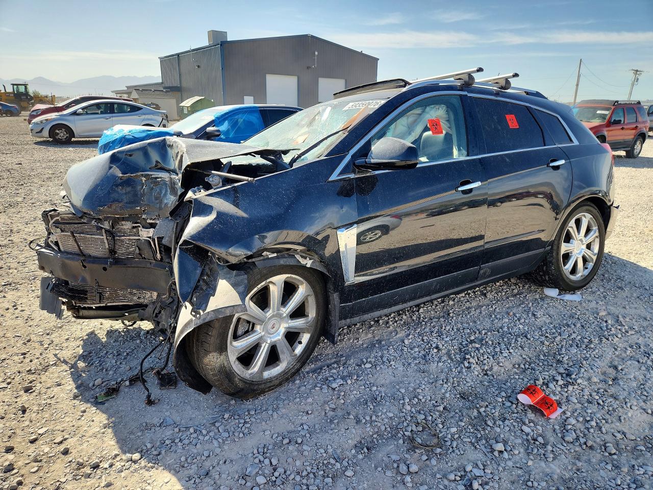 2013 Cadillac SRX Premium Collection, VIN 3GYFNJE3XDS542641 — Rollover