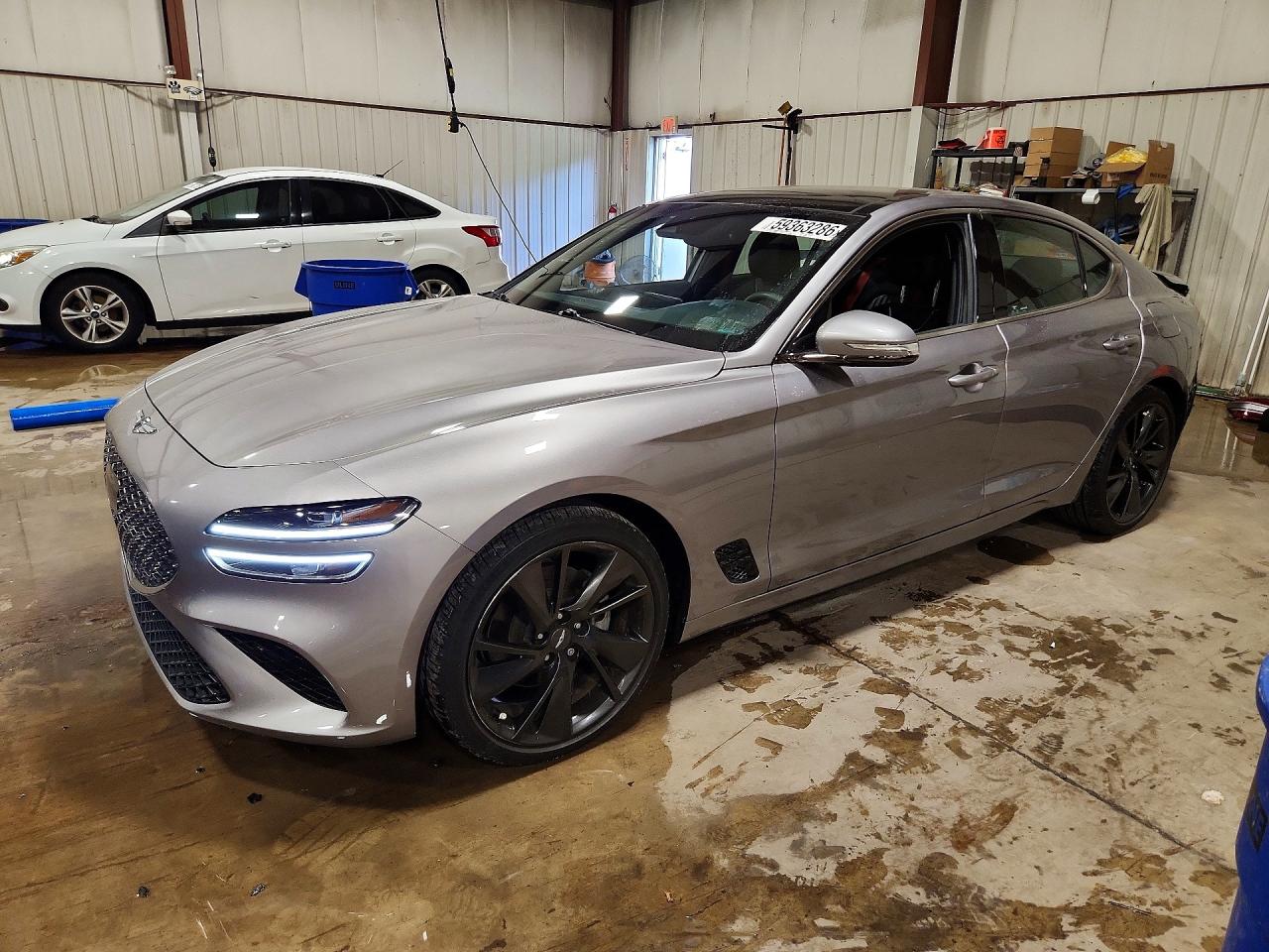 2023 Genesis G70 2.0T, VIN KMTG34TA8PU132266 — Rear end