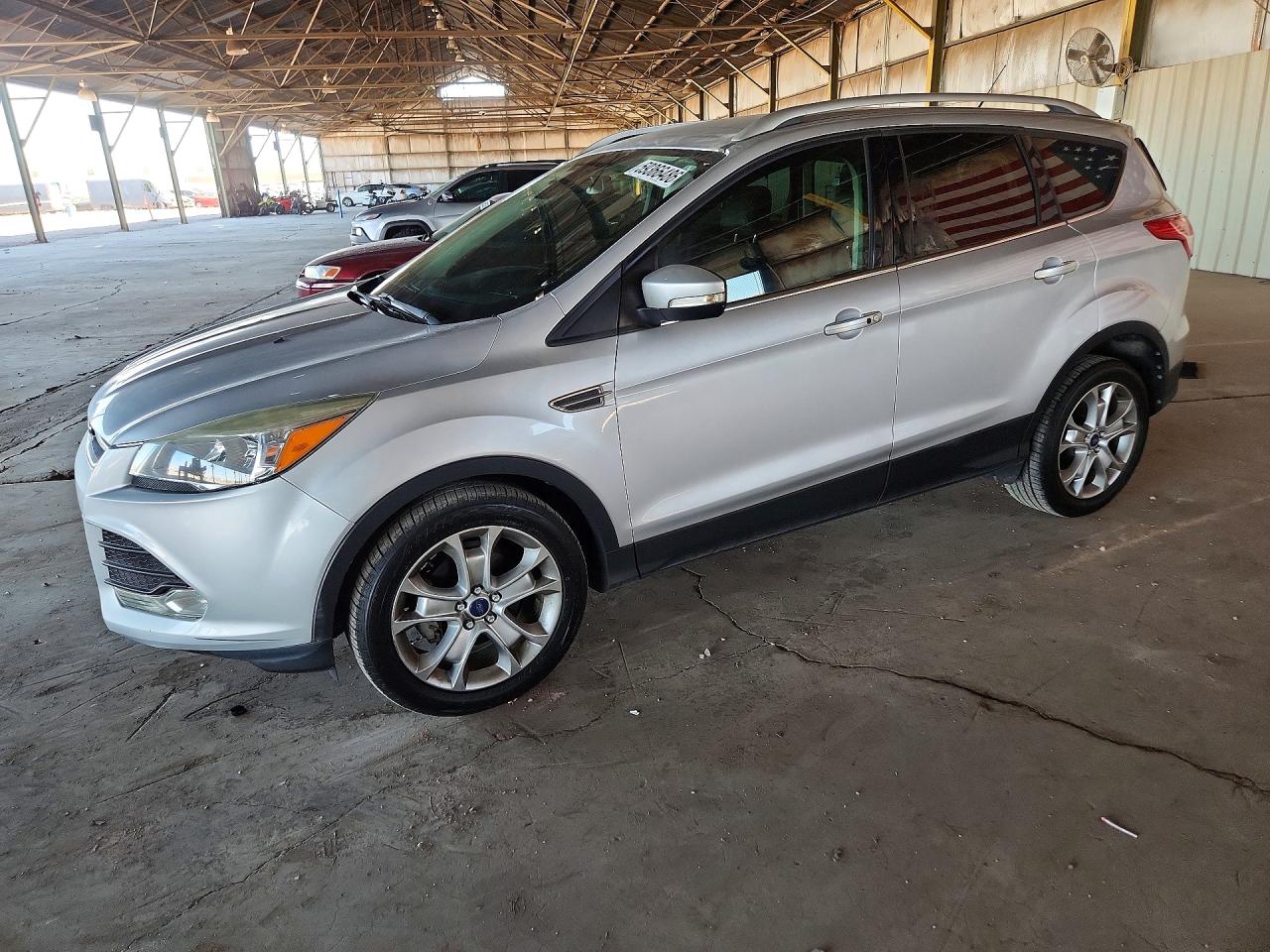2015 Ford Escape Titanium, VIN 1FMCU0JXXFUB36064 — Minor dents and scratches