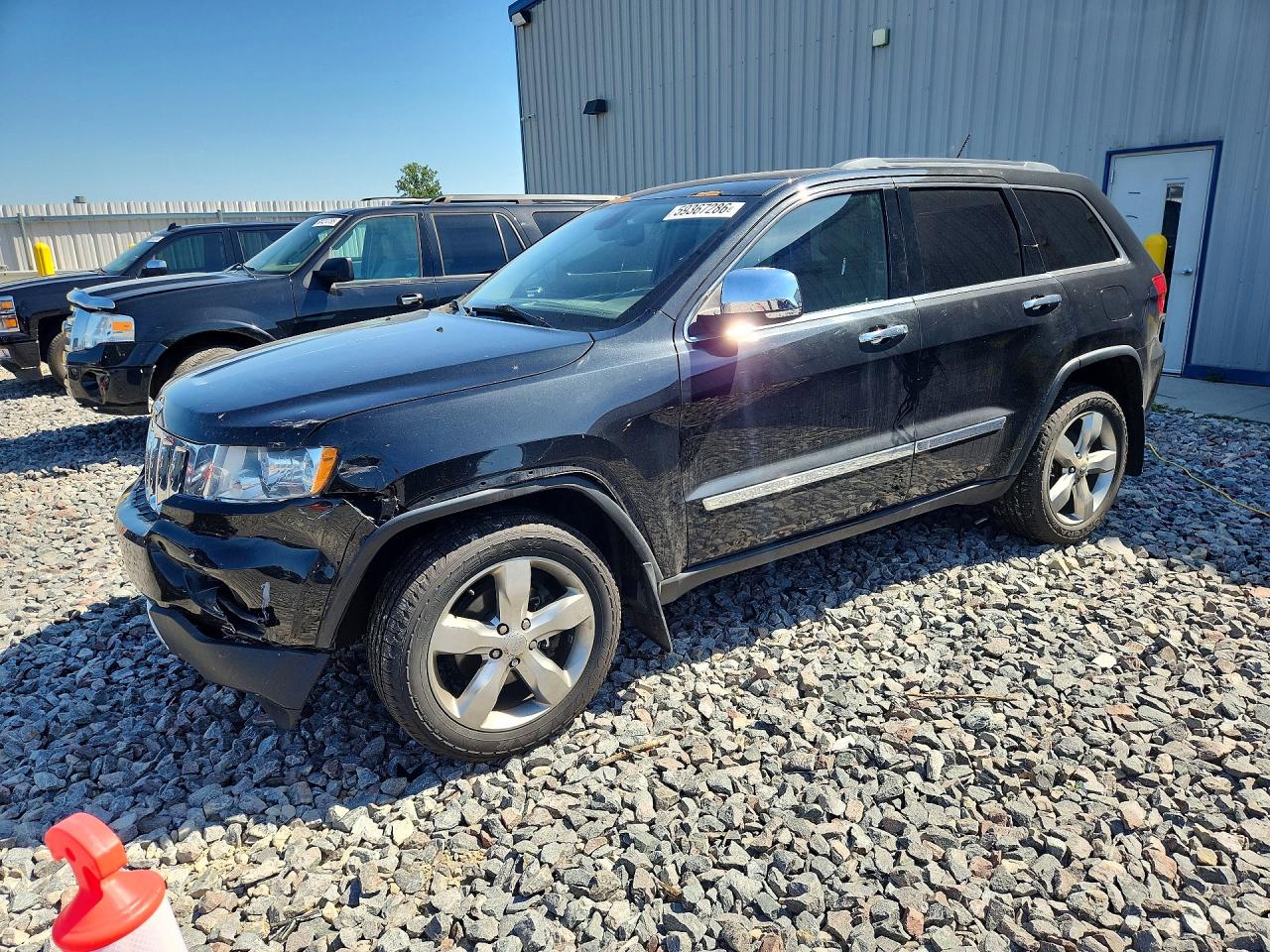 2013 Jeep Grand Cherokee Overland, VIN 1C4RJFCG5DC558186 — Front end