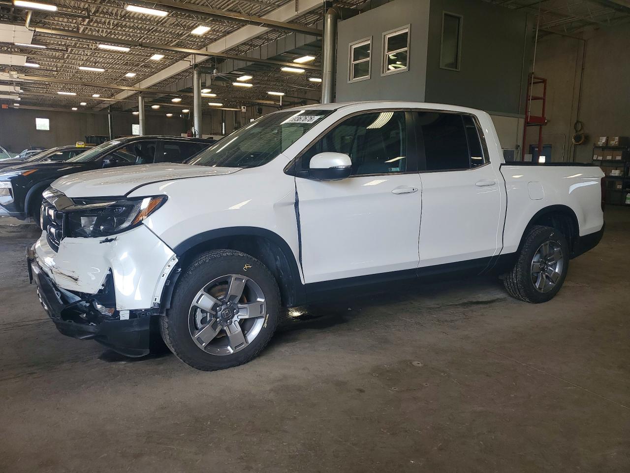 2025 Honda Ridgeline RTL, VIN 5FPYK3F54SB048405 — Front end