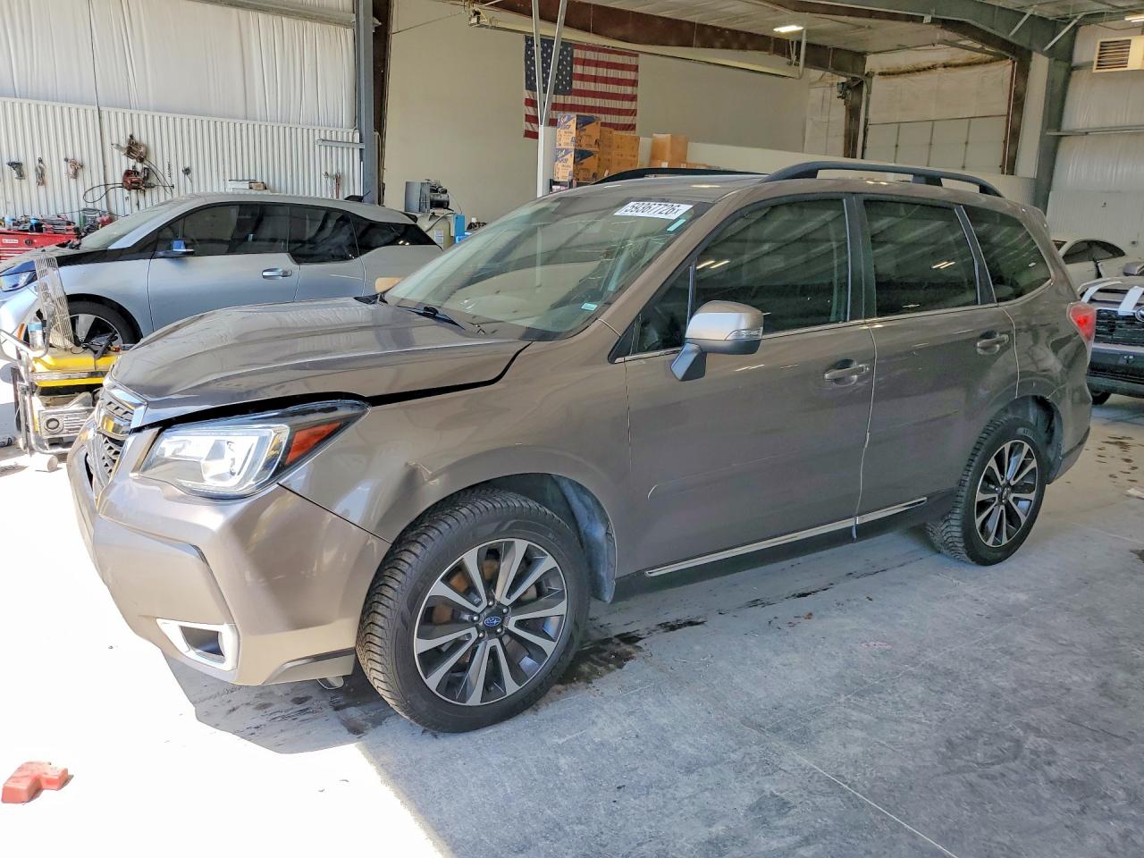 2017 Subaru Forester Touring, VIN JF2SJGTC4HH555729 — Front end